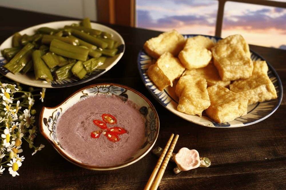 The mam tom–a potent fermented shrimp paste that each diner personalizes with calamansi or lime, sugar, and chili until it becomes a frothy, flavourful sauce.